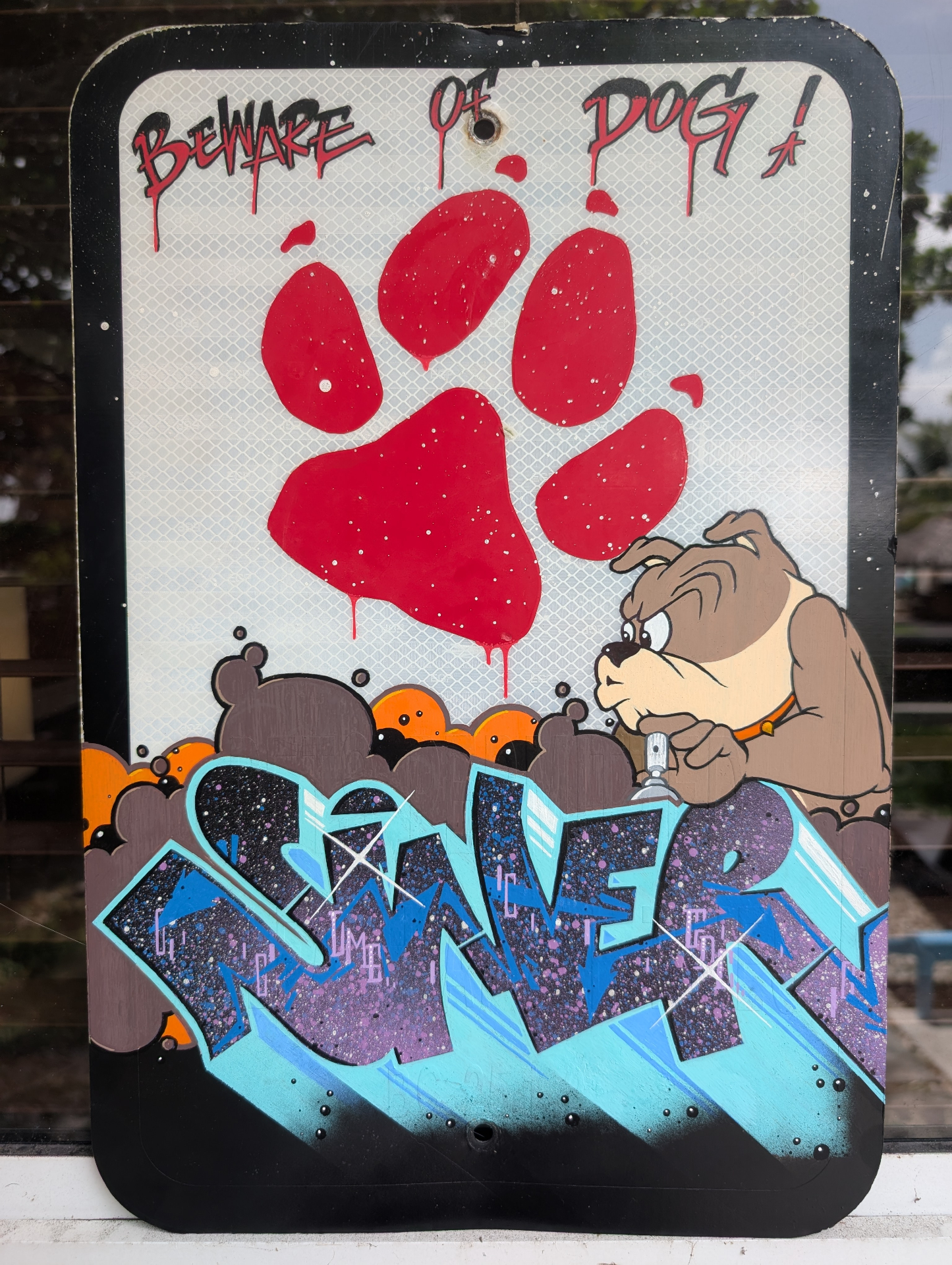 Beware of Dog sign customized with blue and purple SINER piece and bulldog character