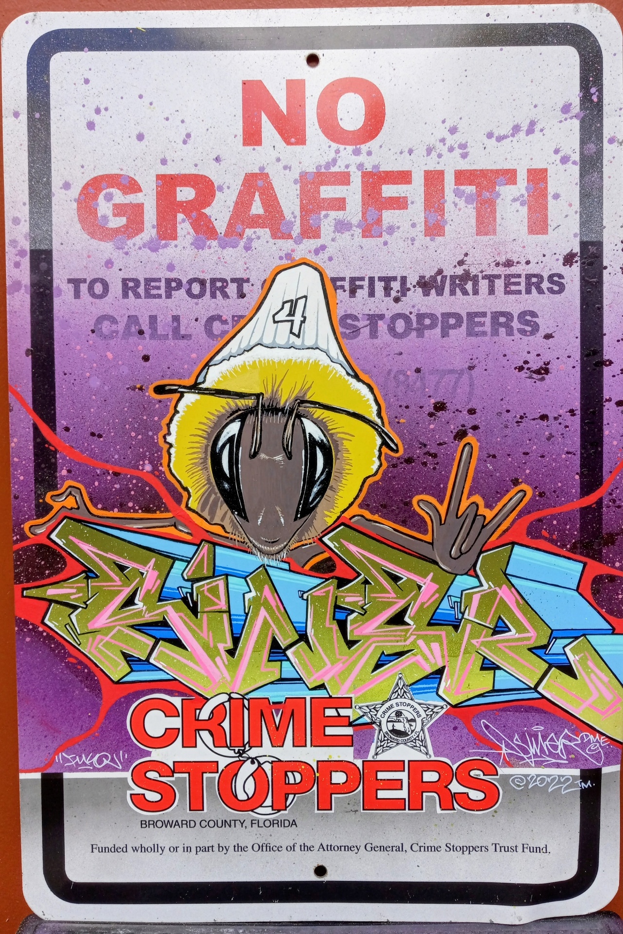 No Graffiti Crime Stoppers sign customized with a bee character and green SINER wildstyle